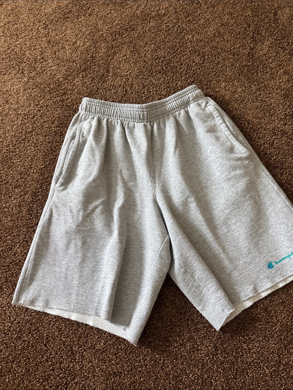 Champion Men’s Light Gray Athletic Shorts with Teal Logo Accent